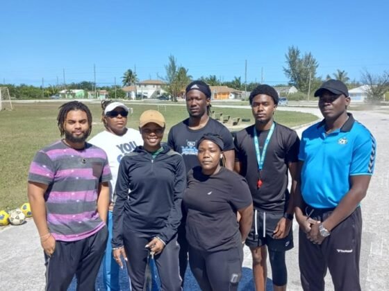 Dedicated participants of the Abaco D License Soccer Coaching Course stand alongside Technical Director Bruce Swan,