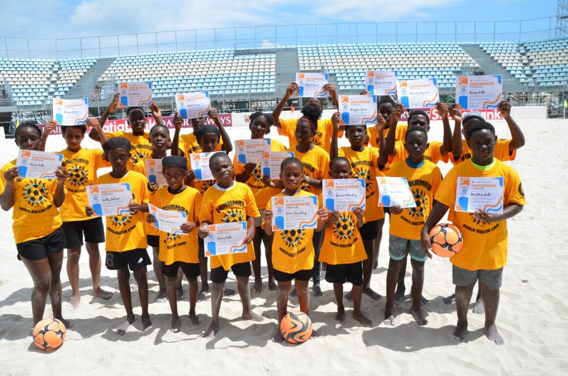 Campers proudly display their certificates